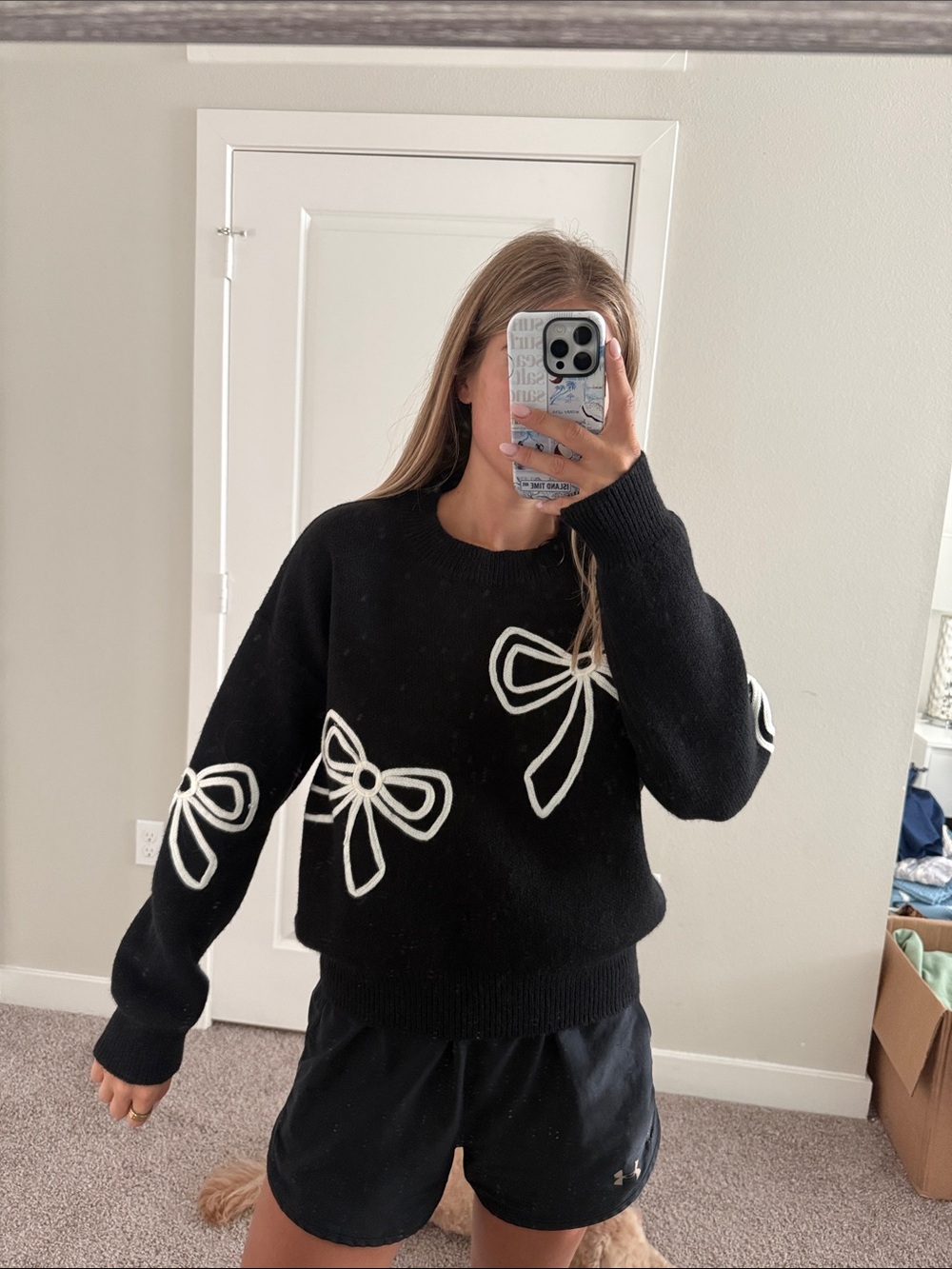 Black sweater with bow detail